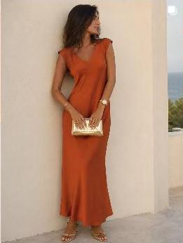 Model in a fitted rust-orange dress, Watermellon Concept Store